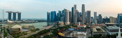 Super wide angle image of Singapore skyscrapers before sunset © hit1912