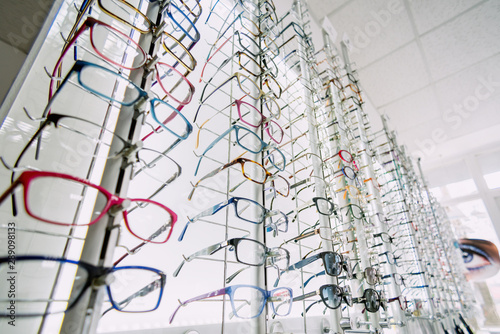 Stand with glasses in the store of optics
