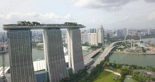 Marina Bay Sansa and Singapore Flyer are shot from the air by drone, Singapore