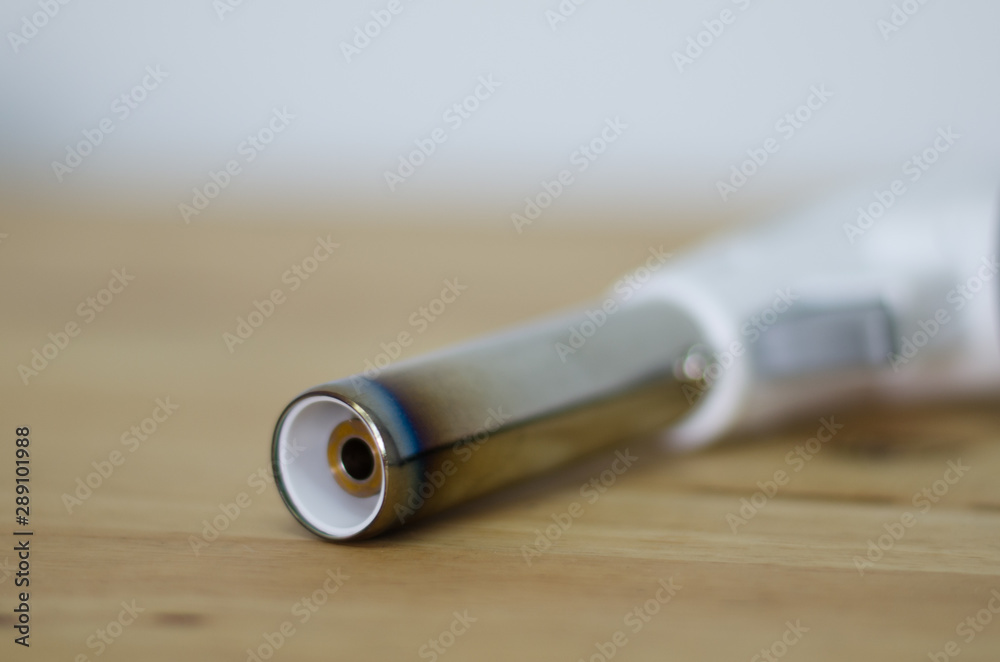 gas flame gun torch fire butane on wood table gas flame gun torch fire butane on wood table