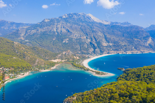 Fototapeta Naklejka Na Ścianę i Meble -  Ölüdeniz is a resort village on the southwest coast of Turkey. It’s known for the blue lagoon of Ölüdeniz Tabiat Parkı and the wide, white Belcekız Beach.	