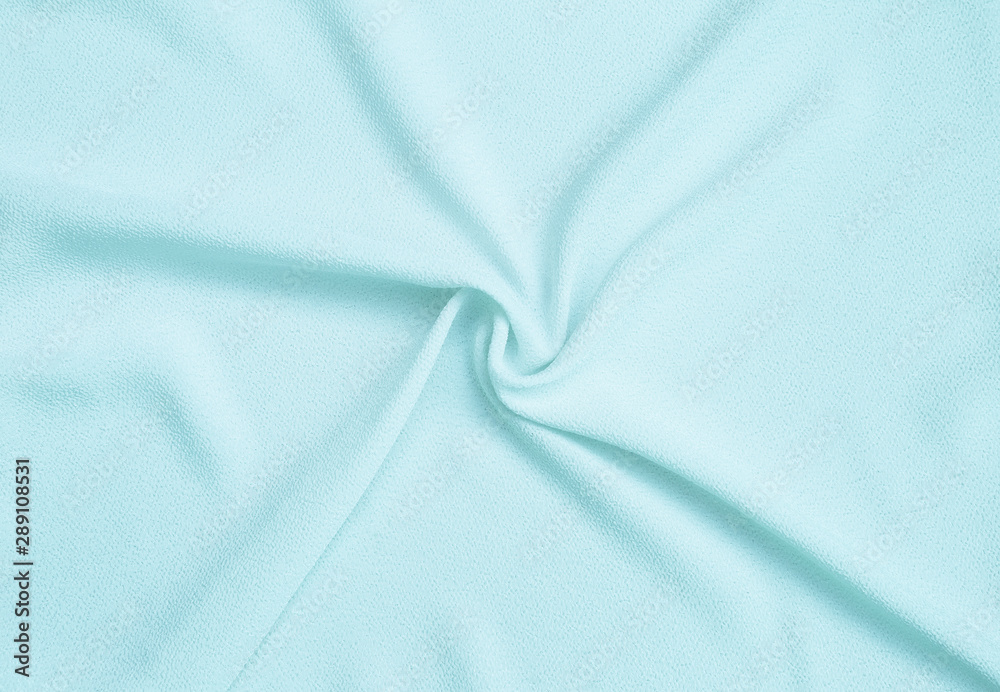 Blank light blue fabric texture background, waving light blue fabric pattern background Blank light blue fabric texture background, waving light blue fabric pattern background