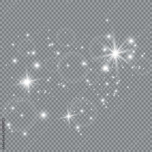 Dust white. White sparks and golden stars shine with special light. sparkles on a transparent background. Christmas abstract pattern. Sparkling magical dust particles.