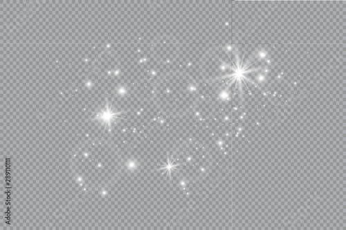 Dust white. White sparks and golden stars shine with special light. sparkles on a transparent background. Christmas abstract pattern. Sparkling magical dust particles.