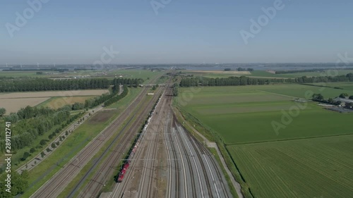 a sunny summer day near the Moerdijk railway bridge. In the background is the rail section of the HSL railway line photo