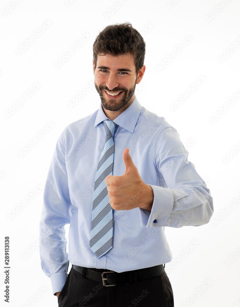 Portrait of attractive stylish and successful businessman smiling with thumbs up gesture