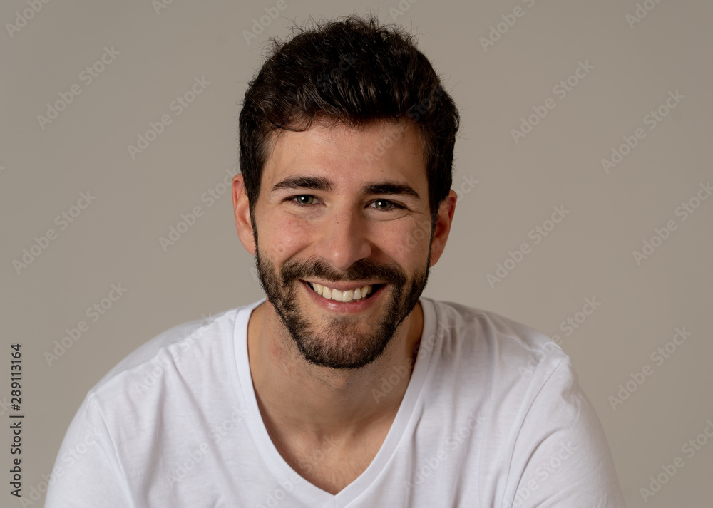 Obraz premium Fashion portrait of Attractive young manly man model posing happy and sexy for the camera