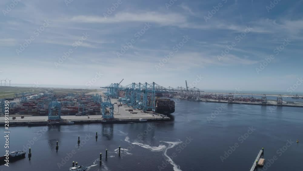 Large container vessel unloaded in Port of Rotterdam Large container vessel unloaded in Port of Rotterdam