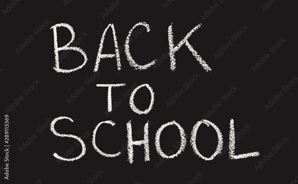 Back to school concept handwriting text with chalk on black Back to school concept handwriting text with chalk on black