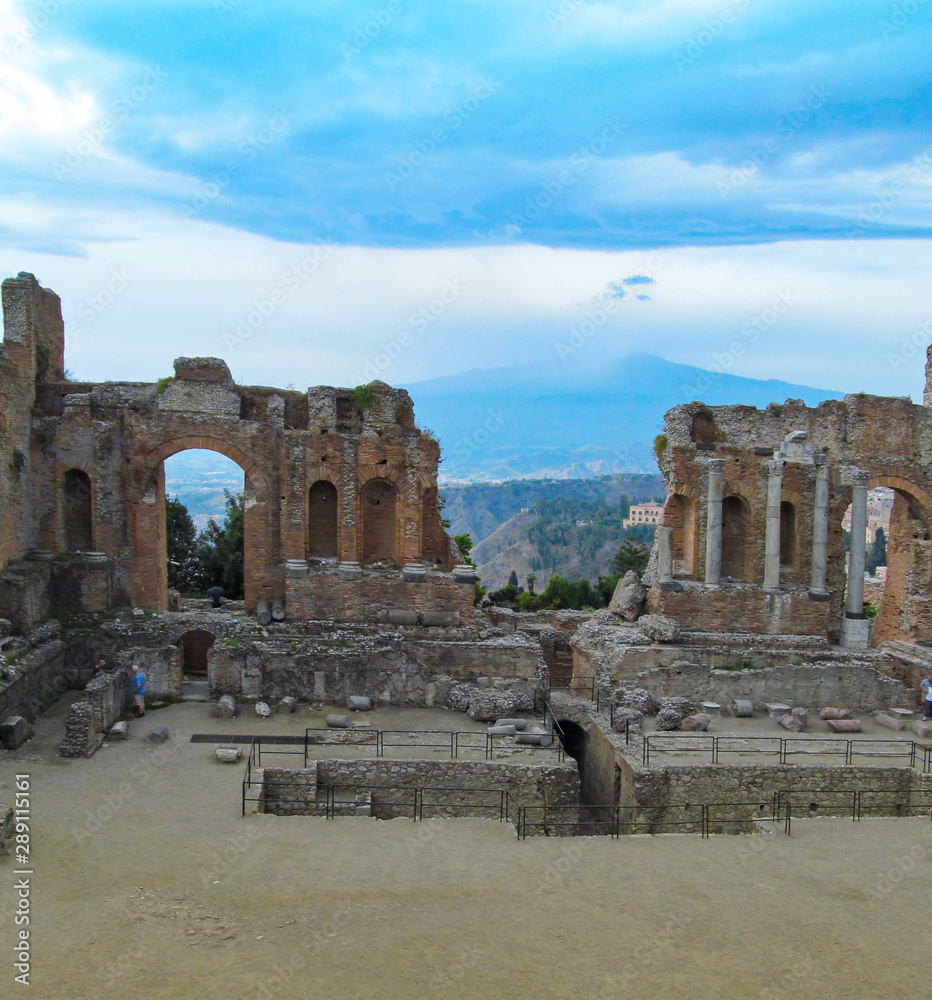 Antique theater in Taormina, Sicily, Italy. Ancient ruins of amphitheater. 