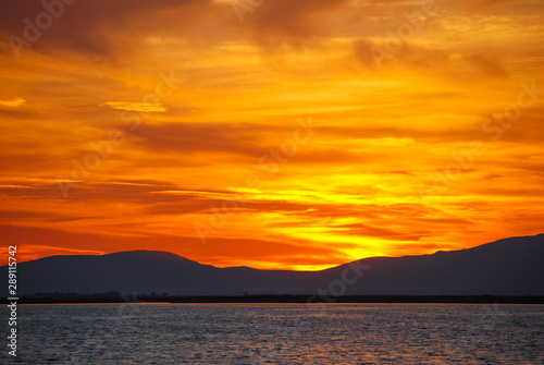 Red sunset over the aegean sea of Izmir, Turkey