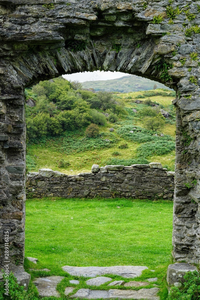 Pastoral Meadow as Seen Through a Stone Window of a Ruined Castle