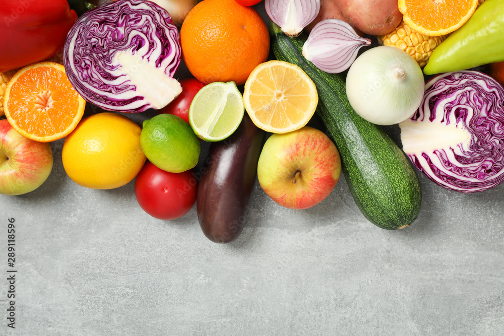 Different vegetables and fruits on grey background, top viewDifferent vegetables and fruits on grey background, top view Different vegetables and fruits on grey background, top viewDifferent vegetables and fruits on grey background, top view
