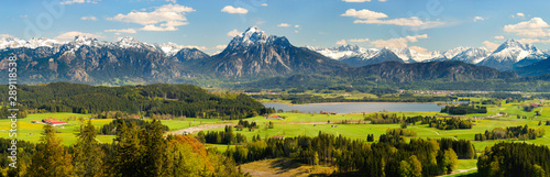 Panorama Landschaft in Bayern mit Hopfensee im Allgäu und der Bergkette der Alpen mit Berg Säuling vor Füssen photo