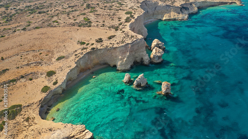 Aerial drone photo of tropical exotic white rock secluded rocky bay with turquoise sea