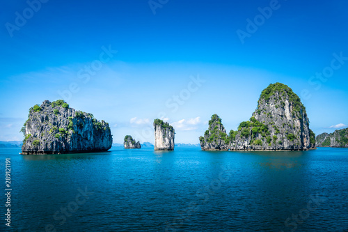 Bai tu long bay (Halong bay) rock karst formations in the sea, Vietnam landscape. Holiday tourist attraction.