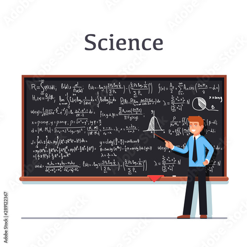 Young university professor standing in front of chalkboard filled with formulas giving lecture on mathematics