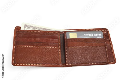 Closeup brown genuine leather wallet with US dollar banknote and credit card isolated on white background with clipping path