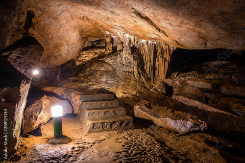 Nguom Ngao cave in North Vietnam, Cao Bang province. Walking path inside the cave.  photo