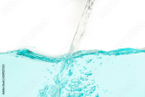 Water splash with bubbles on  white background.