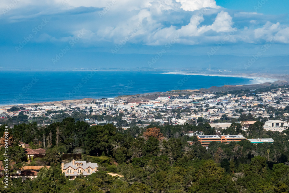 View of Monterey Bay in California, from a nearby hilltop, including cities of Monterey and Seaside. 