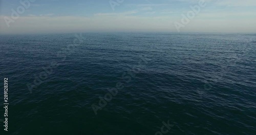 Wallpaper Mural Aerial view, dolly in of calm, blue sea. Slow motion. Torontodigital.ca