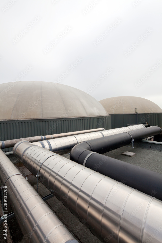 Biogas containers. Silos. Green energy. Gas production. Manure gas Biogas containers. Silos. Green energy. Gas production. Manure gas