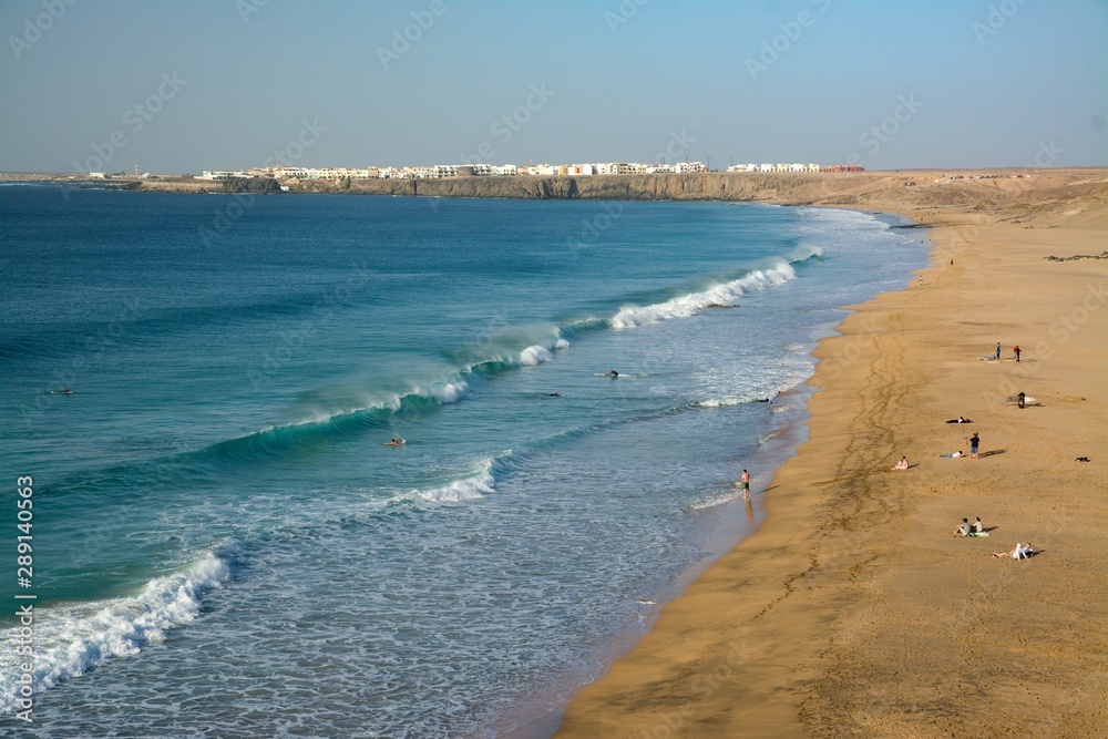 view of beach with sea and blue sky