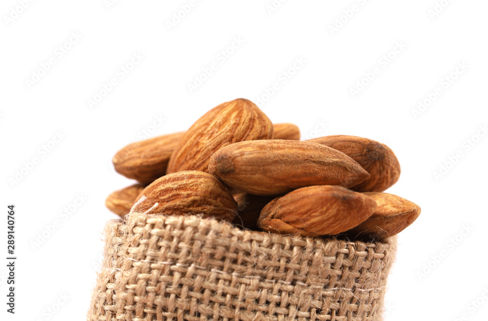 Almond. Almond nuts, close-up isolated on a white background Almond. Almond nuts, close-up isolated on a white background