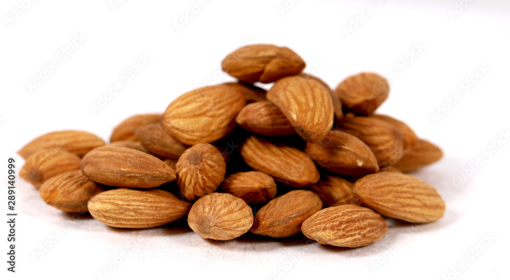Almond. Almond nuts, close-up isolated on a white background Almond. Almond nuts, close-up isolated on a white background