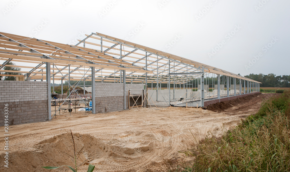 Building site. Building a cattle stable. Construction site. Netherlands Building site. Building a cattle stable. Construction site. Netherlands