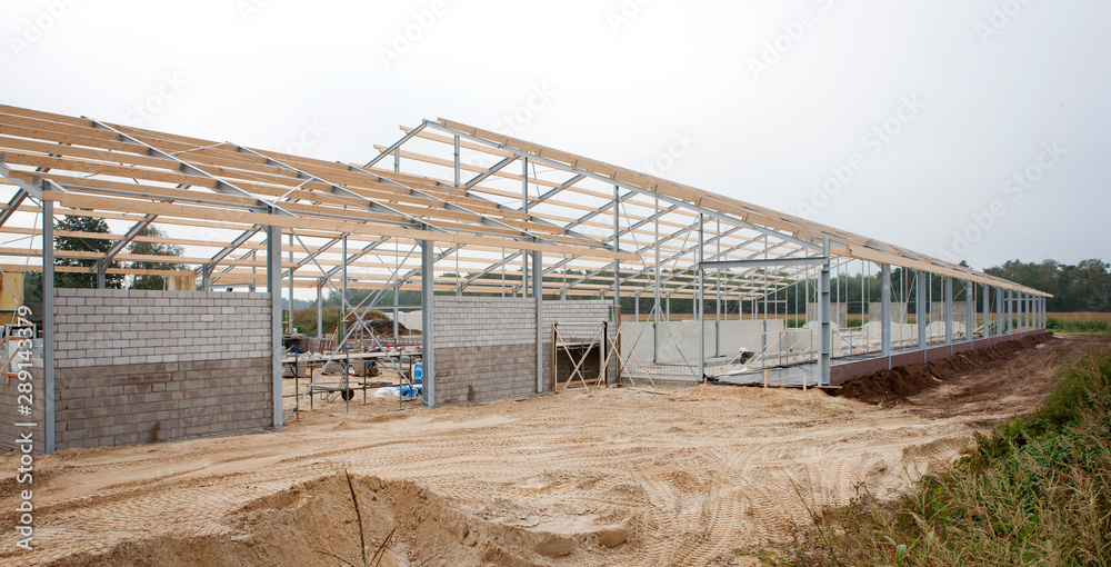 Building site. Building a cattle stable. Construction site. Netherlands Building site. Building a cattle stable. Construction site. Netherlands