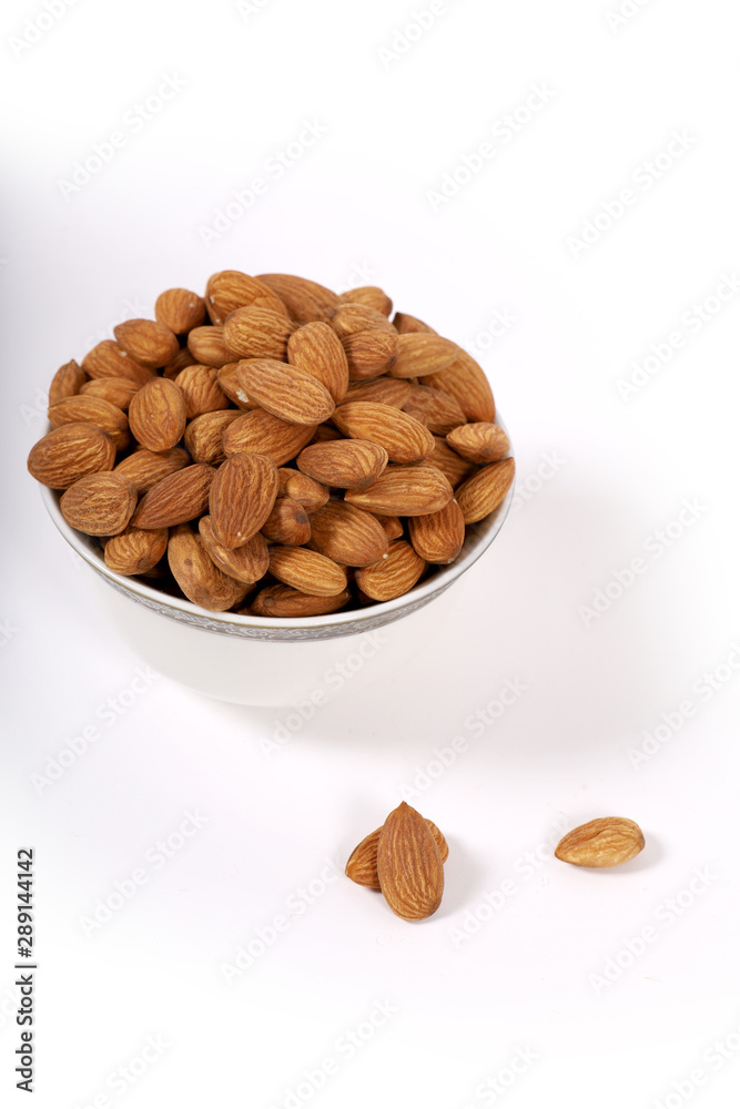 Almond. Almond nuts, close-up isolated on a white background Almond. Almond nuts, close-up isolated on a white background