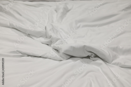 Crumpled of bedding sheet background.