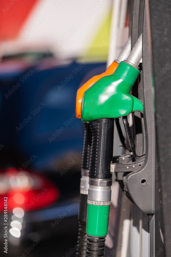 View of a Colorful Petrol pump filling nozzles, Gas station in a service View of a Colorful Petrol pump filling nozzles, Gas station in a service