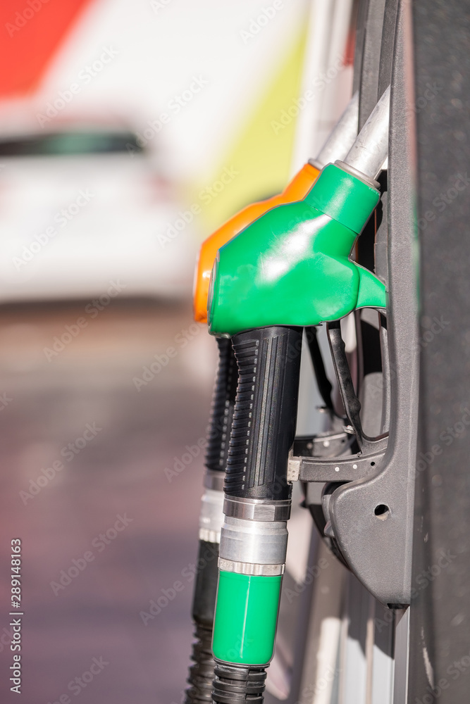 View of a Colorful Petrol pump filling nozzles, Gas station in a service View of a Colorful Petrol pump filling nozzles, Gas station in a service