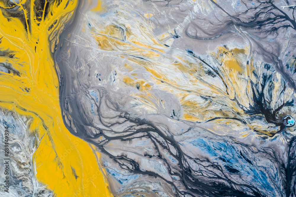 Degraded landscape. Destroyed land. View from above. Surrealistic lake.Human impact on the environment. View from above. Photo captured with drone