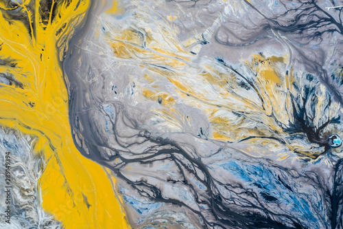 Obraz na płótnie Degraded landscape. Destroyed land. View from above. Surrealistic lake.Human impact on the environment. View from above. Photo captured with drone w salonie