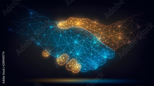 Two wire-frame glowing hands, handshake, technology, business, trust concept photo