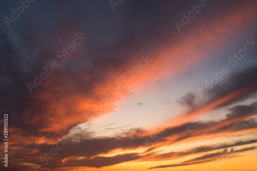 Beautiful colorful sunset with clouds © alipko