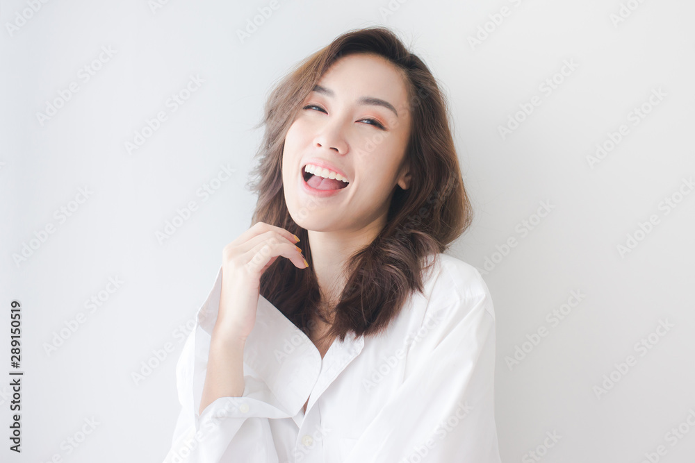 Indoors portrait of beautiful young girl laughing Indoors portrait of beautiful young girl laughing