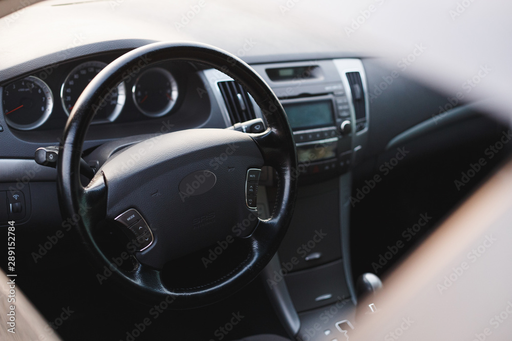 Car interior, driver's seat through the window