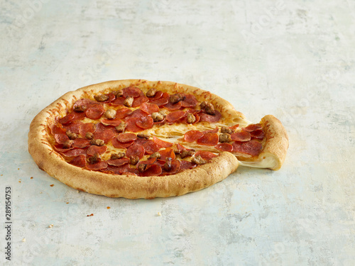 Stuffed crust pizza with meatballs and pepperoni