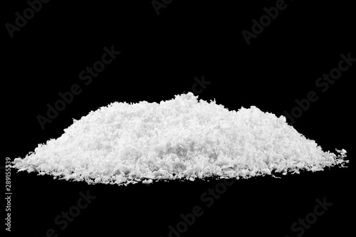Close up image of white snow on black background. Snowflakes on a black background.