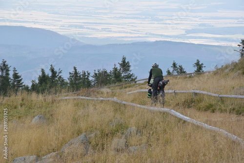 Cyclist riding in the mountains