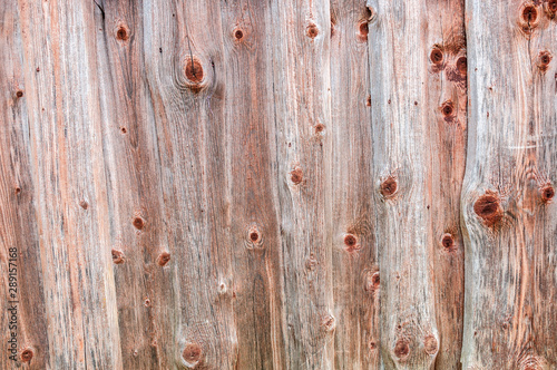 Old wooden planks with natural patterns as background