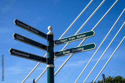 Wooden guide poles and tourists information  poles in Southport, England. photo