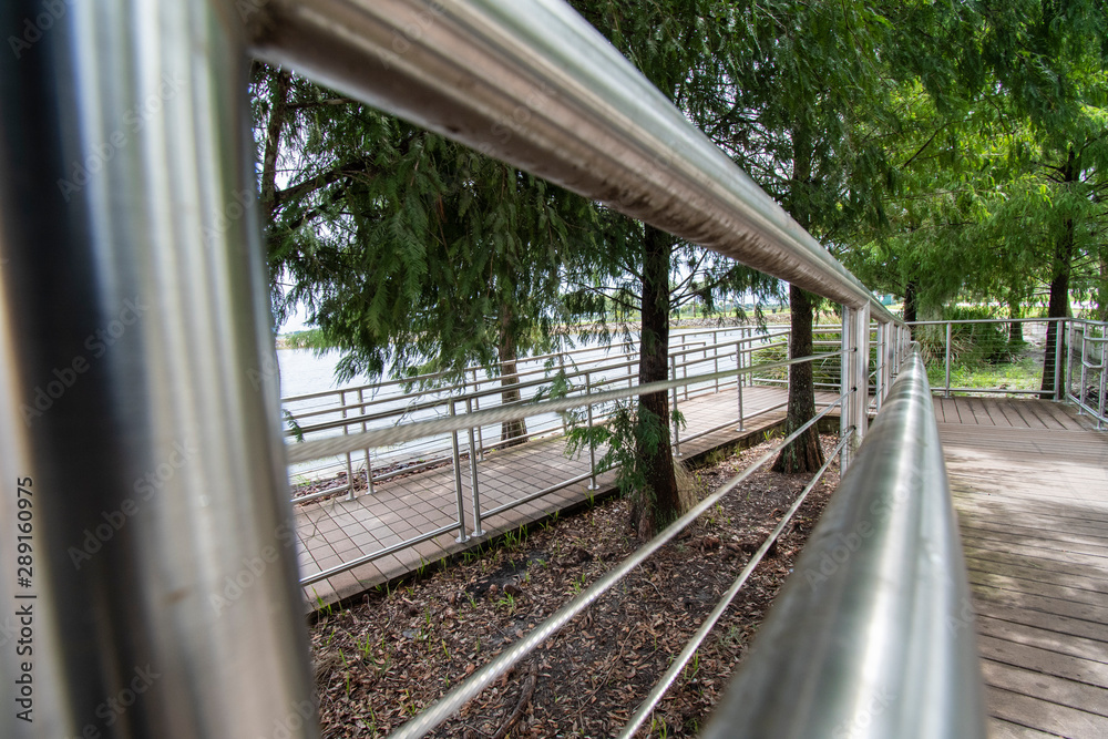 Close up of a rail in a beautiful park. Close up of a rail in a beautiful park.