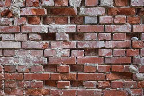 Corroded brick wall