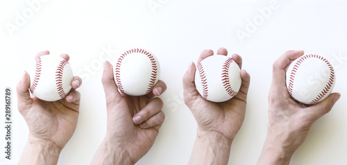 Fotografija Baseball balls in hand on white background, pitching concept.